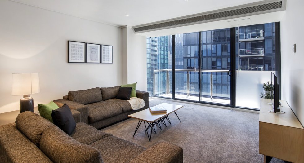 nook melbourne city apartment living room and balcony view